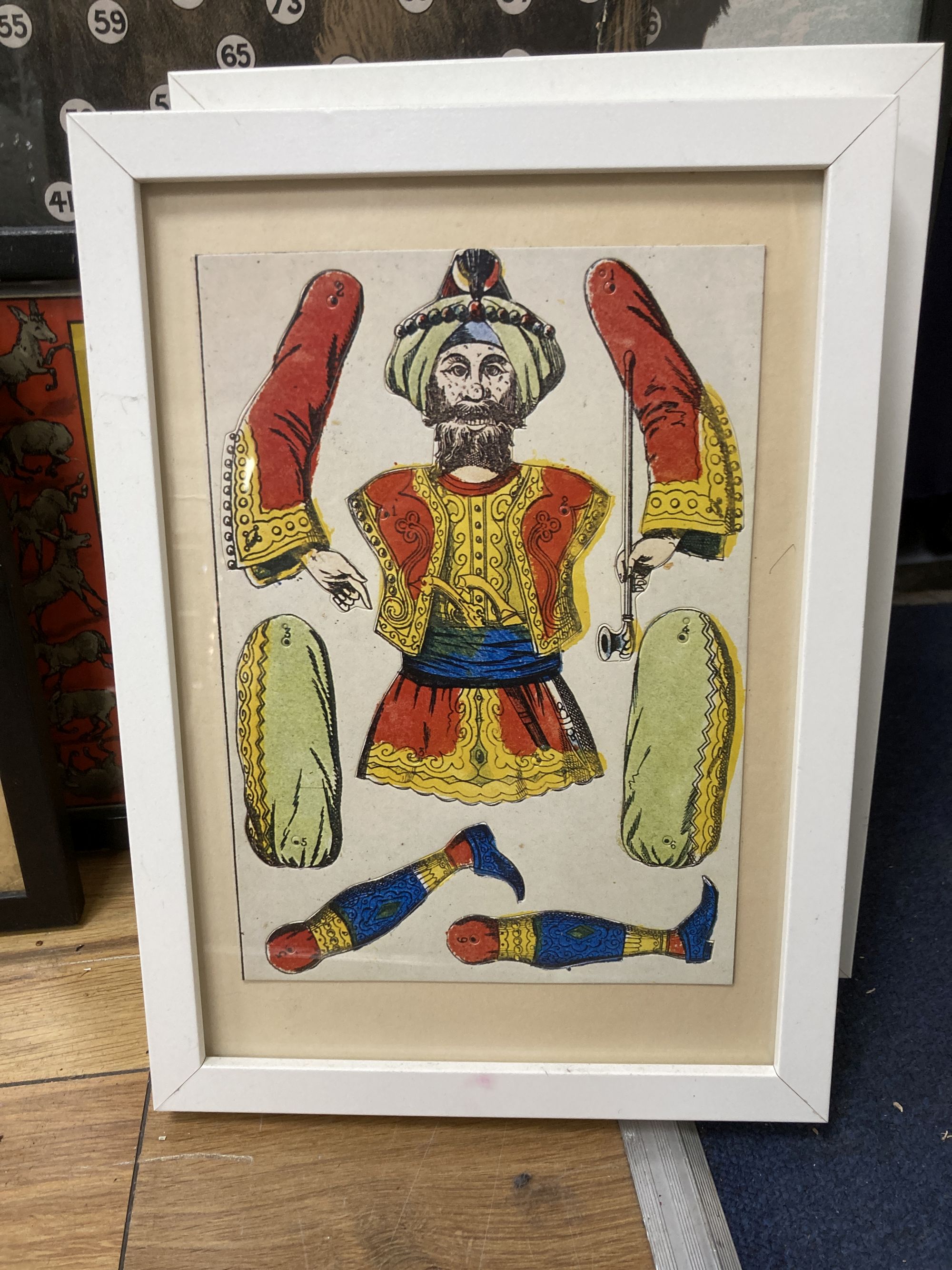 A group of Victorian and later chromolithographs and colour prints, including The tail-less donkey, 54 x 72cm and two jig-saw puzzles